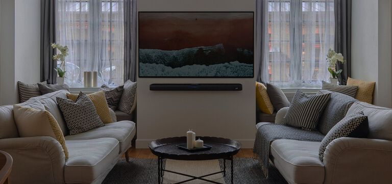 Living room with Polk sound bar and tv