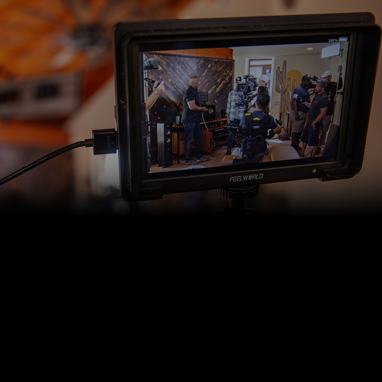 a tv crew seen through a camera